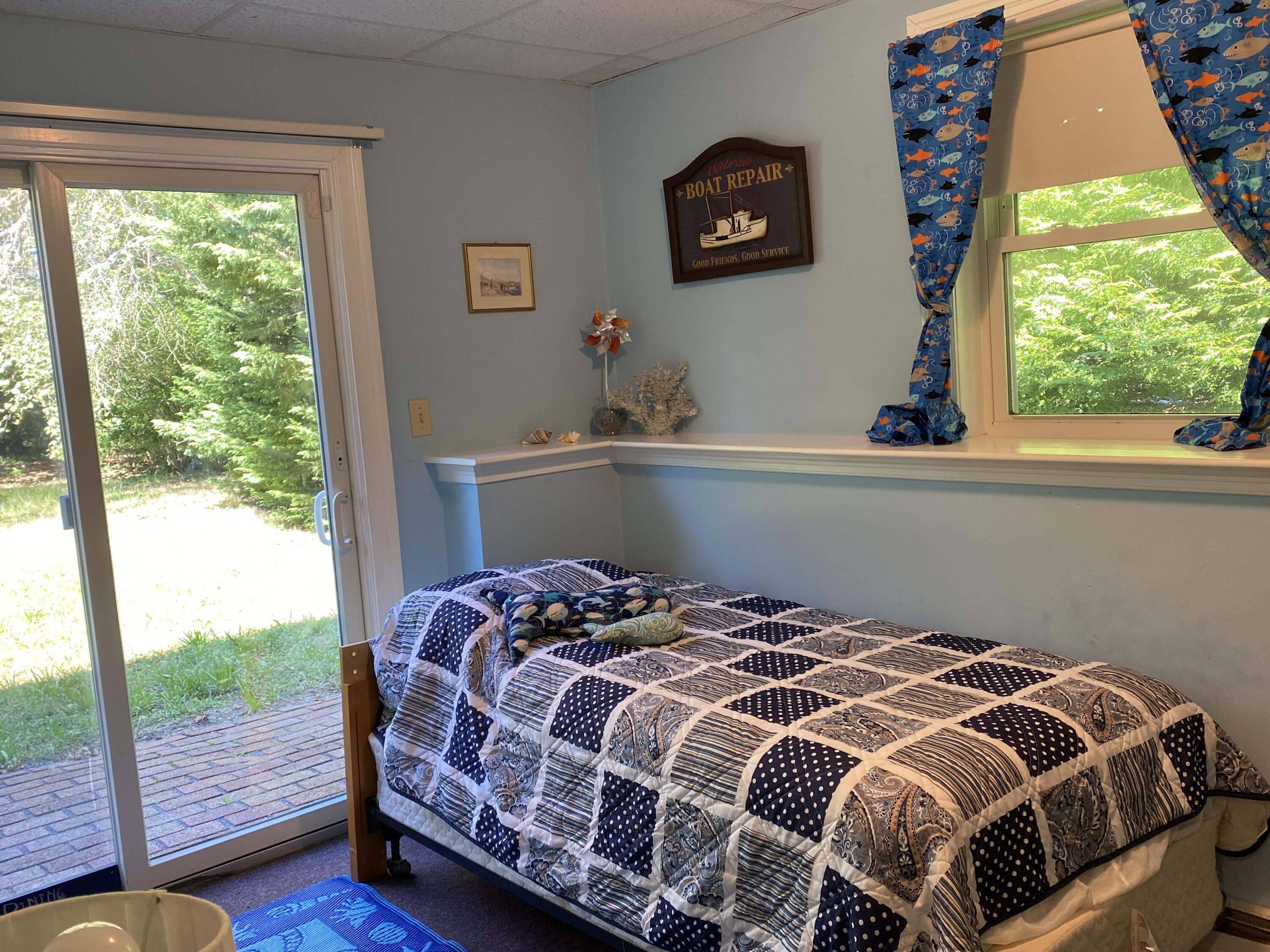 25 Ripple Cove Road Hyannis, MA 02601 - Photo 30 of 38 a bedroom with a bed and window