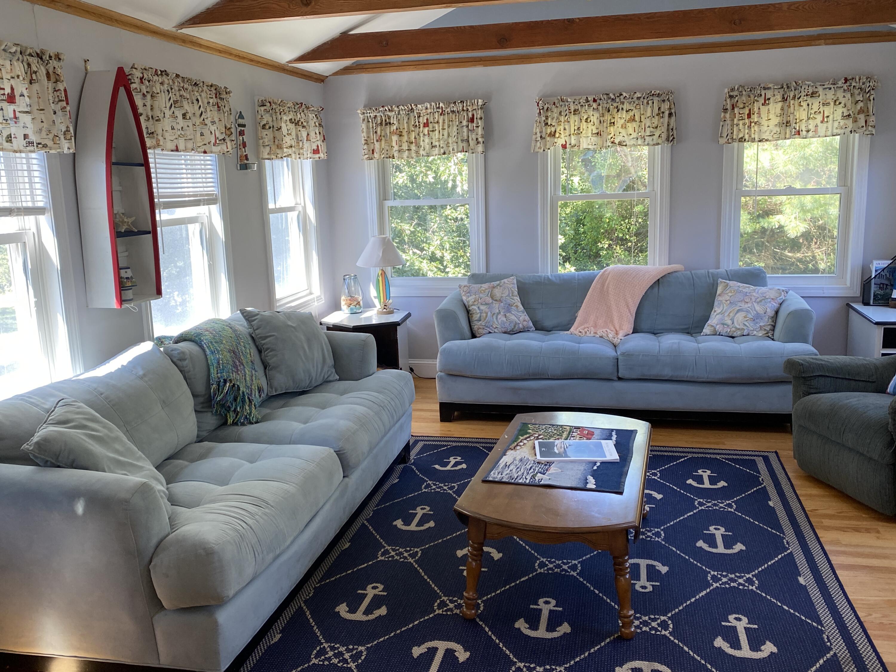 25 Ripple Cove Road Hyannis, MA 02601 - Photo 7 of 38 a living room with furniture and a large window