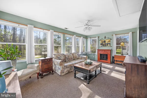 a kitchen with stainless steel appliances granite countertop a stove a microwave and cabinets