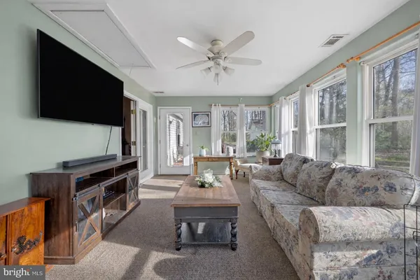 a kitchen with stainless steel appliances granite countertop a stove a refrigerator and a microwave