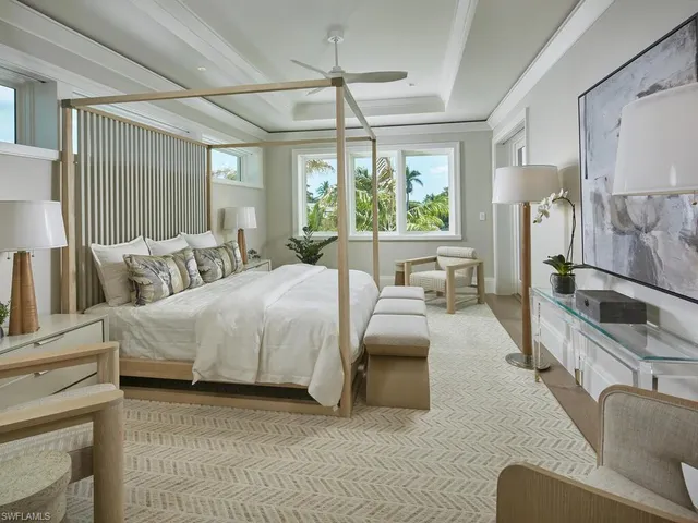 a bathroom with a bathtub and a sink