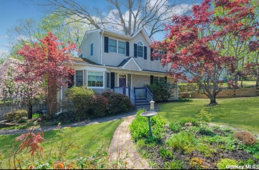 111 Rosewood Road Kings Park, NY 11754 - Photo 1 of 1 a view of a yard in front of house