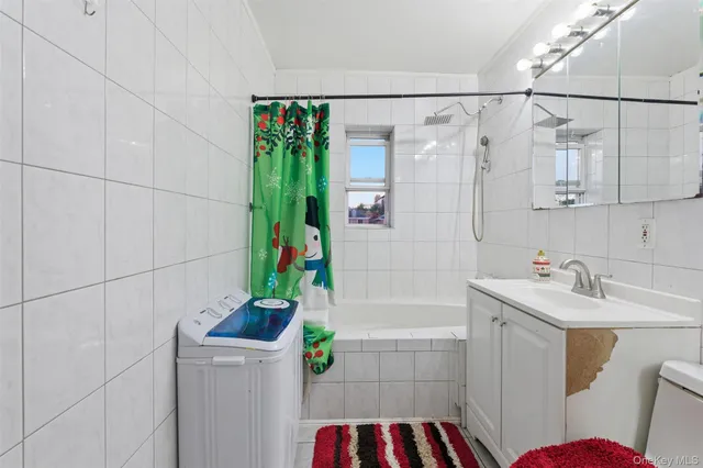 $938,000 | 1408 Astor Avenue | Pelham Gardens