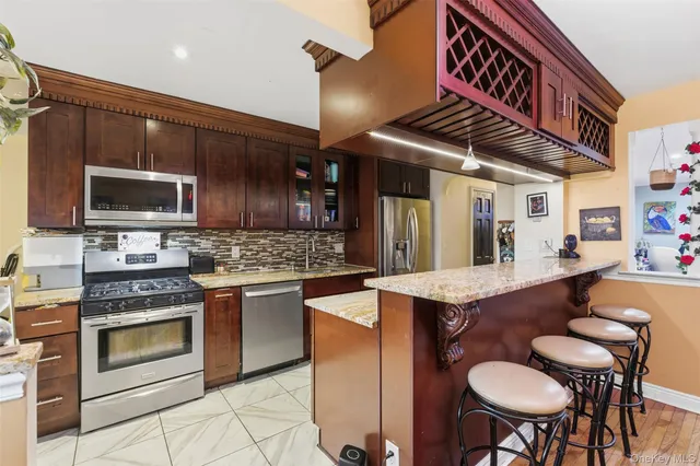 $938,000 | 1408 Astor Avenue | Pelham Gardens