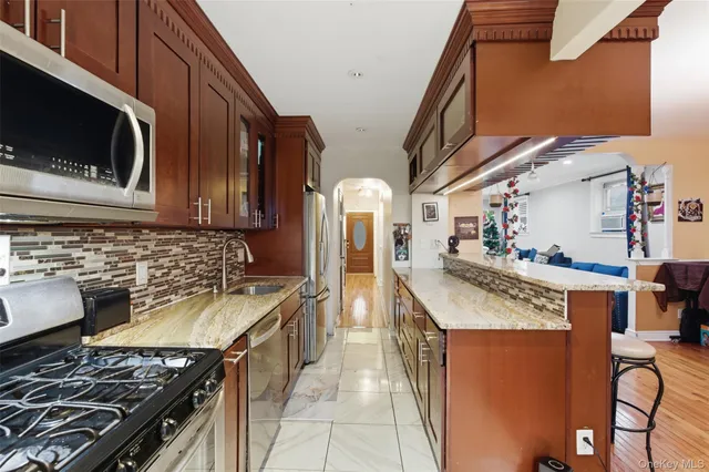 $938,000 | 1408 Astor Avenue | Pelham Gardens