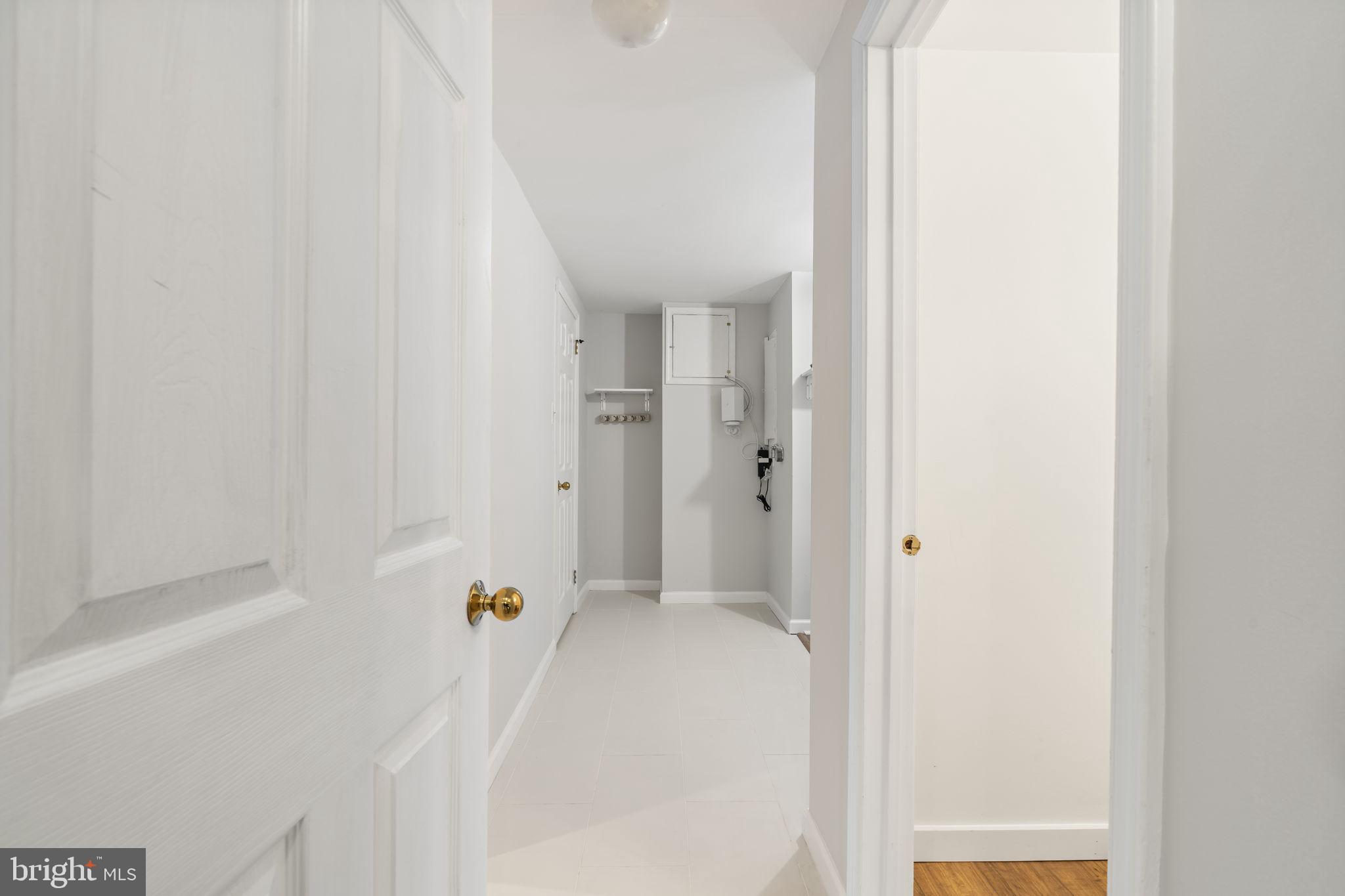 69 Main Street Chesterbrook, PA 19087 - Photo 42 of 49 Lower level with storage, laundry, and half bath