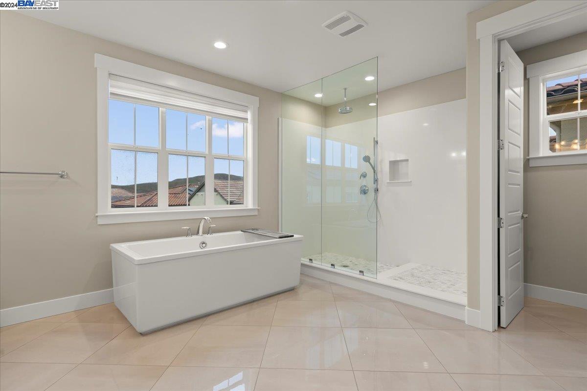 2969 Delamar Drive Dublin, CA 94568 - Photo 12 of 27 a bathroom with a bathtub and shower