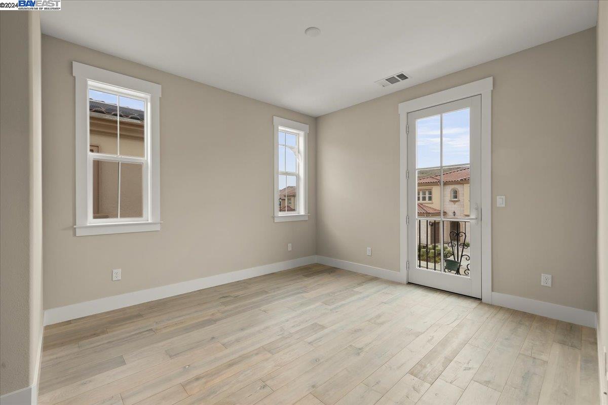 2969 Delamar Drive Dublin, CA 94568 - Photo 19 of 27 an empty room with windows