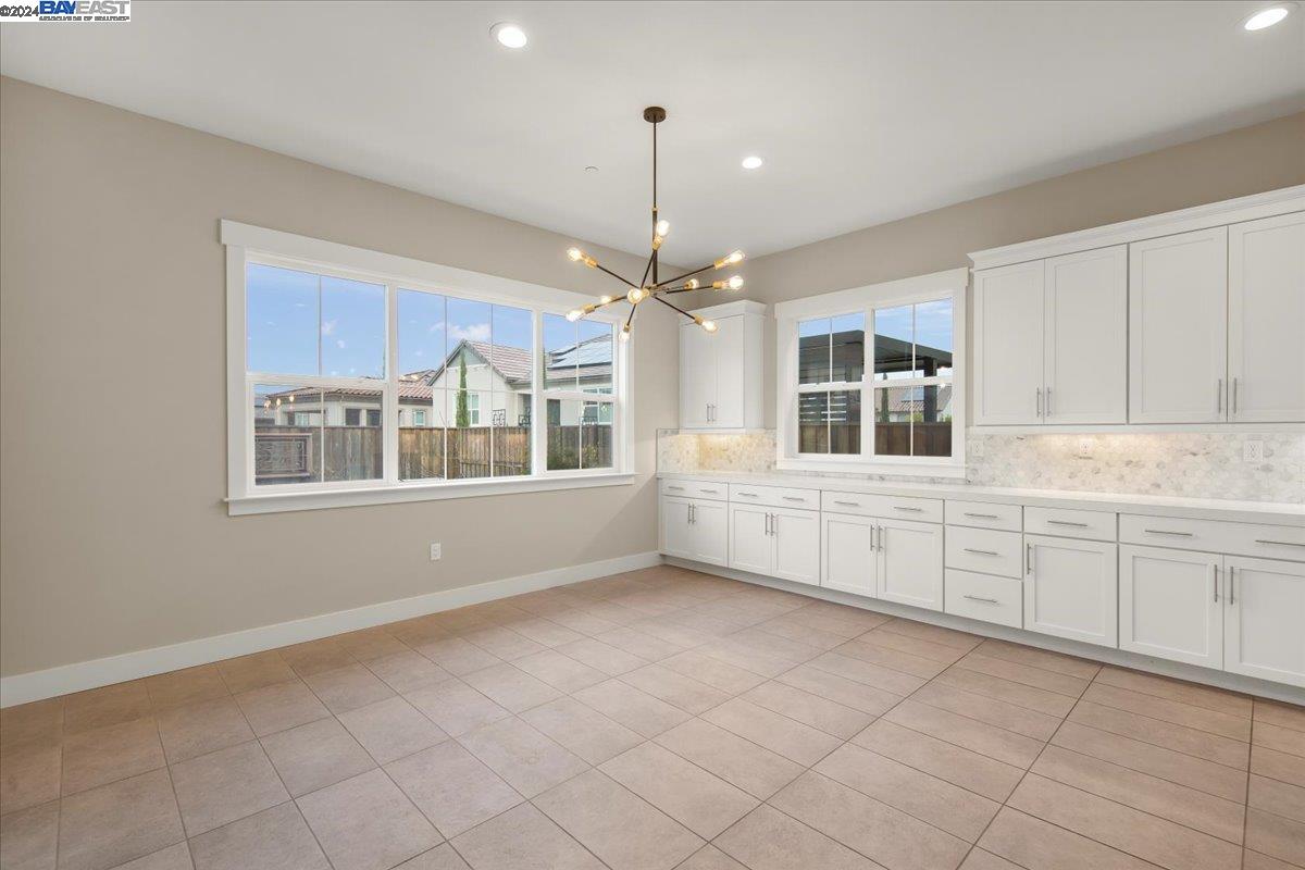 2969 Delamar Drive Dublin, CA 94568 - Photo 7 of 27 a view of an empty room with window and cabinet