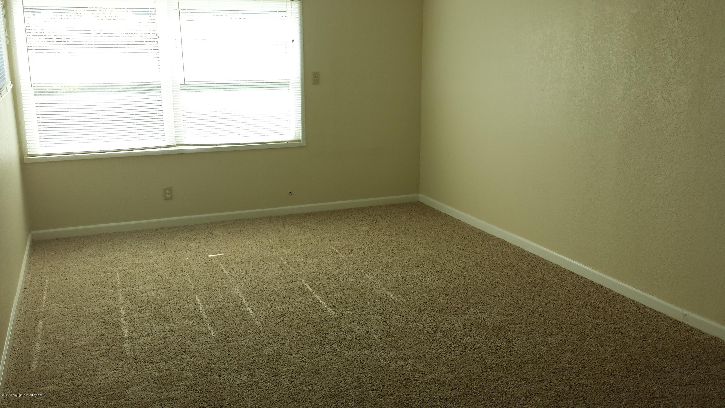 4420 South Hayden Street Amarillo, TX 79110 - Photo 2 of 16 a view of a room with a window