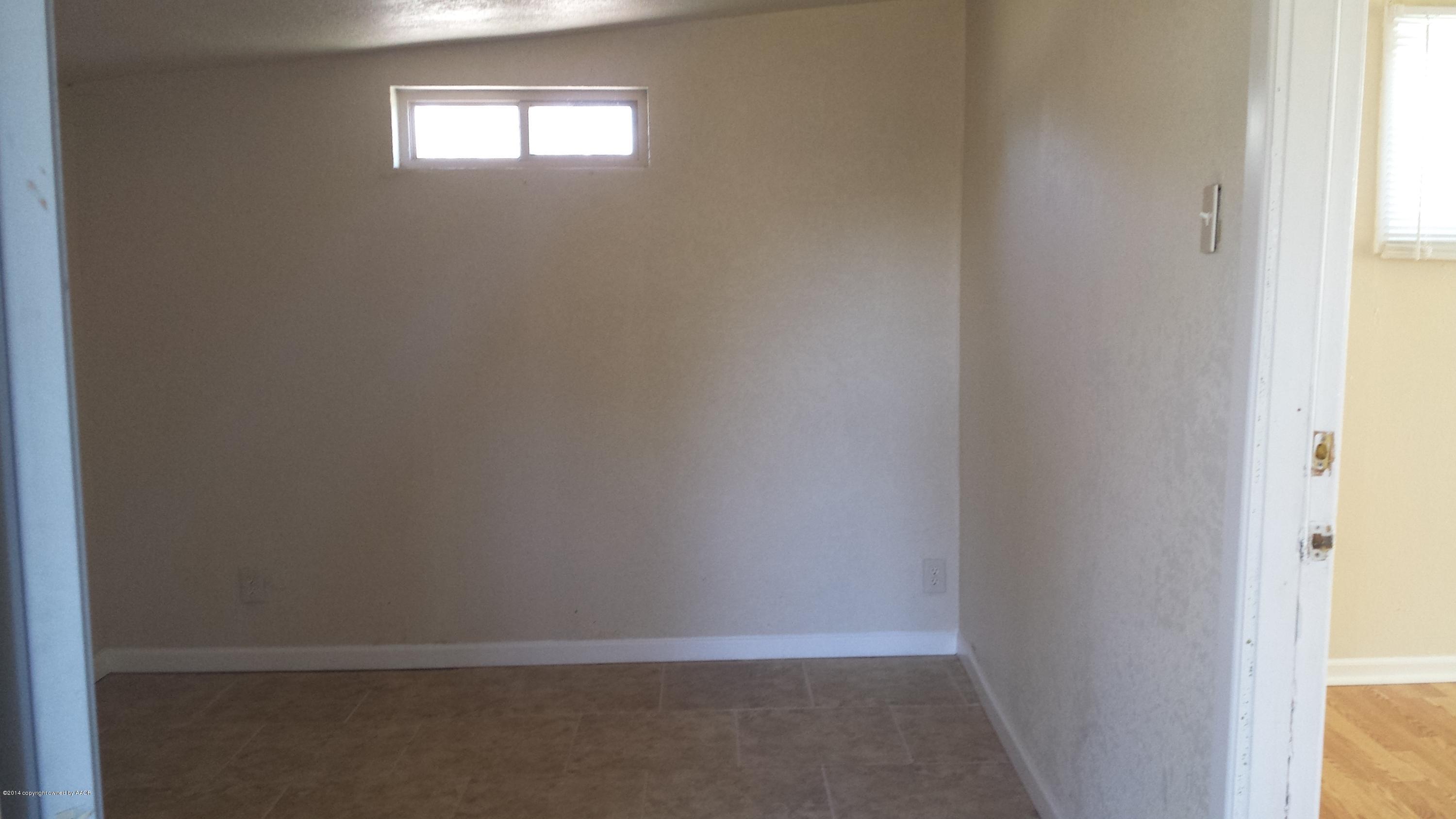 4420 South Hayden Street Amarillo, TX 79110 - Photo 14 of 16 a view of an empty room and window