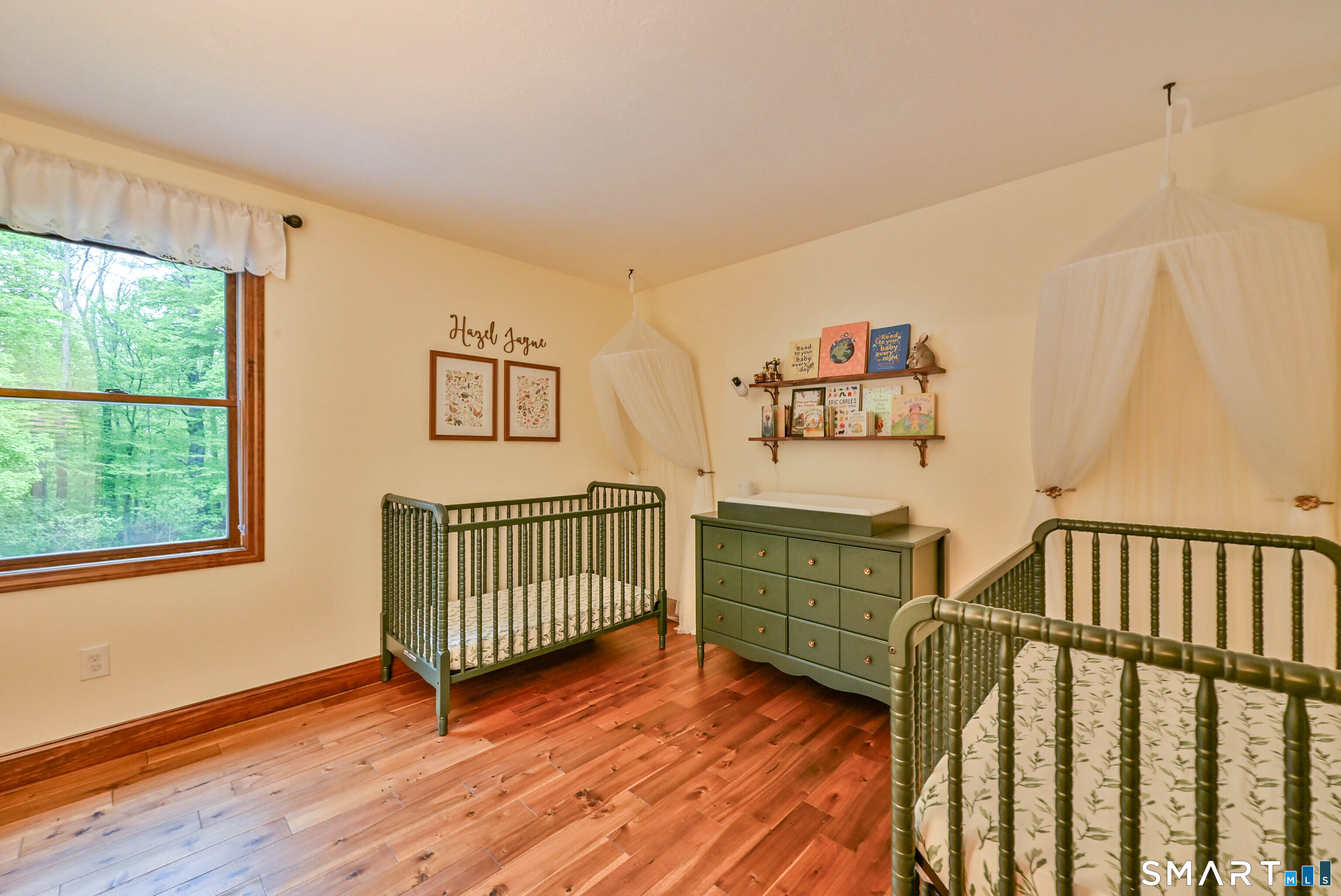 309 O'Leary Road Thompson, CT 06277 - Photo 31 of 40 a bedroom with furniture and a window