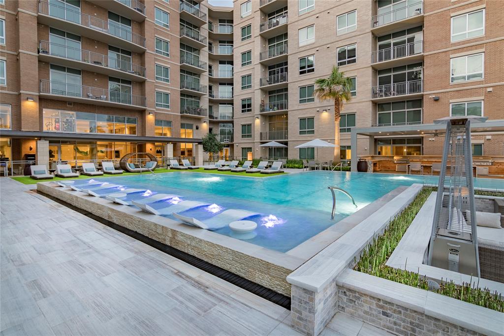 4719 Cole Avenue, Unit 708 Dallas, TX 75205 - Photo 20 of 35 a view of a building with a swimming pool