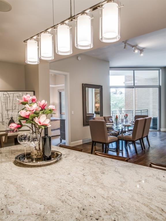 4719 Cole Avenue, Unit 708 Dallas, TX 75205 - Photo 6 of 35 a view of a dining room with furniture