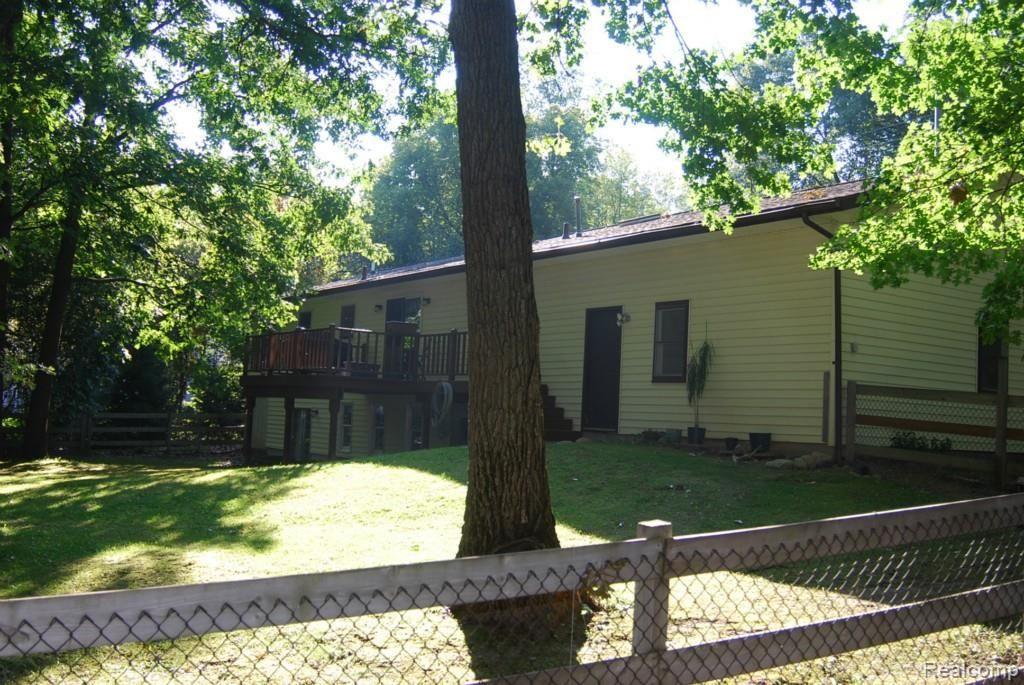 3765 Curdy Road Howell, MI 48855 - Photo 30 of 38 Rear