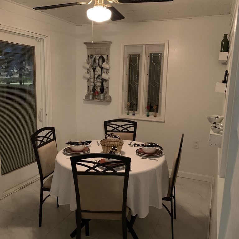 23 Notre Dame Street Springfield, MA 01104 - Photo 19 of 28 a dining room with furniture and window