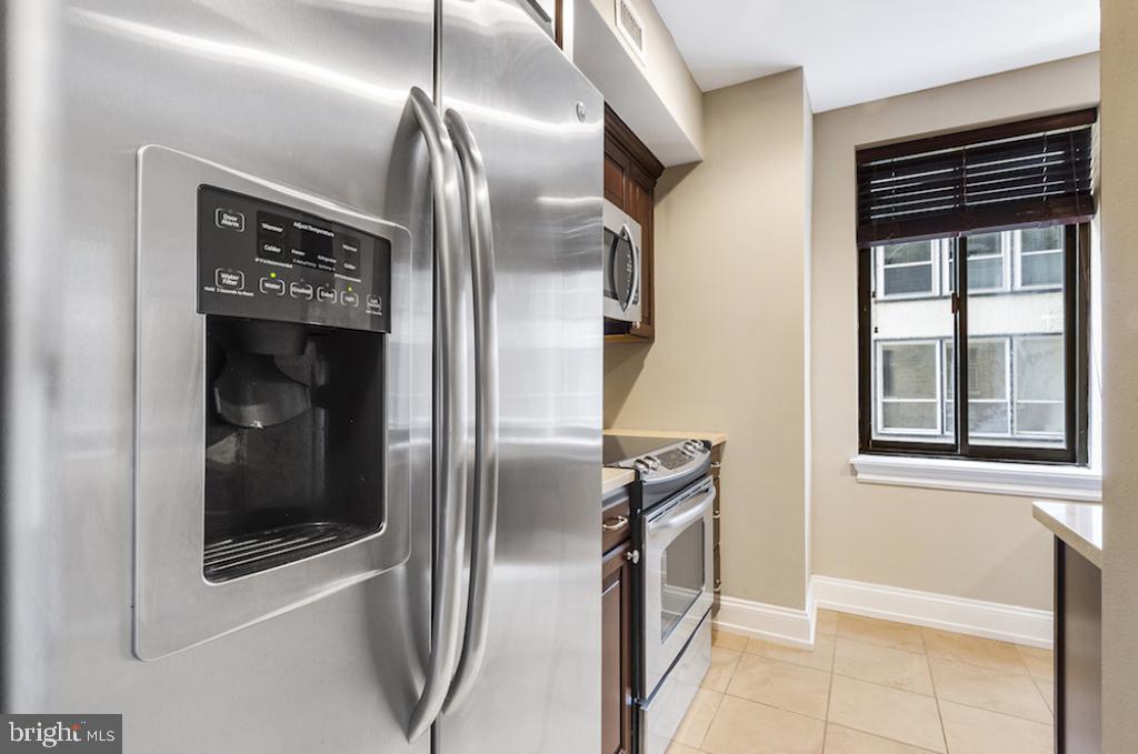 222 West Rittenhouse Square, Unit 804 Philadelphia, PA 19103 - Photo 24 of 29 a view of a refrigerator in kitchen and entryway