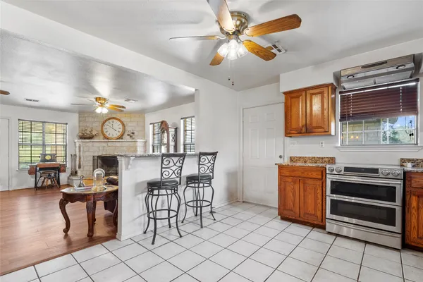 a view of kitchen with furniture and window