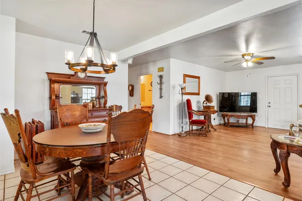 a kitchen with stainless steel appliances granite countertop a refrigerator sink and stove