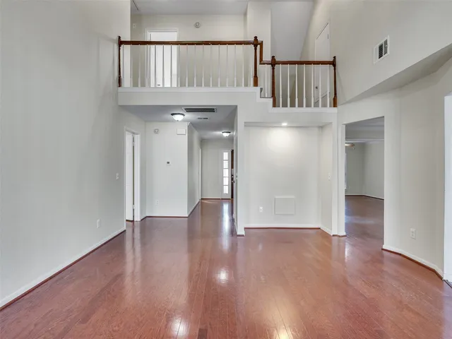 a view of entryway with wooden floor