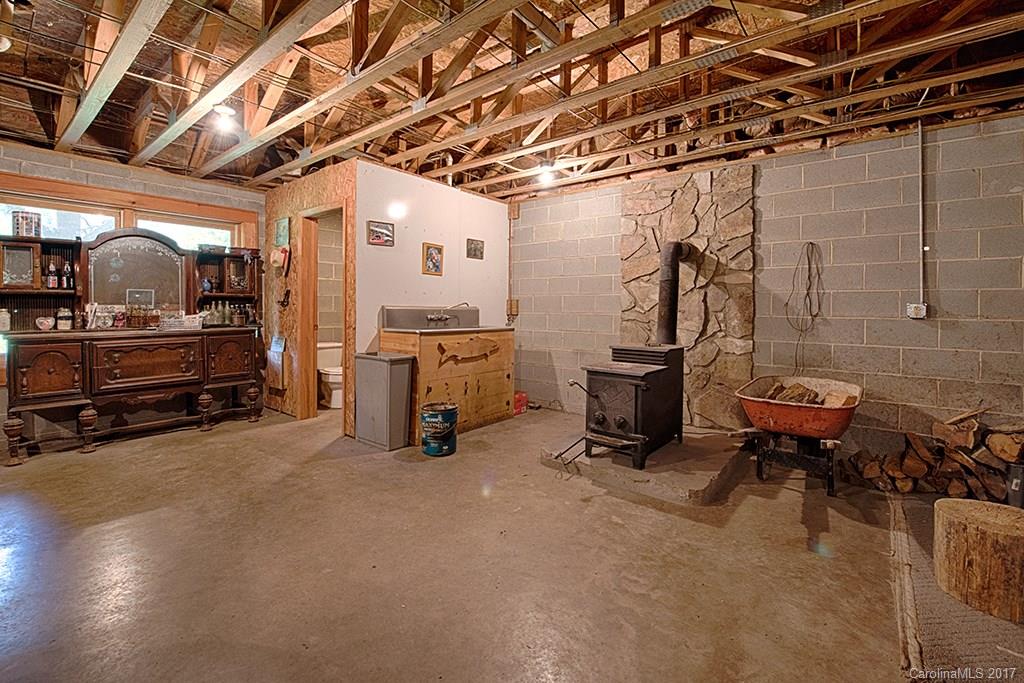 95 Straightup Road Maggie Valley, NC 28751 - Photo 16 of 24 a view of a room with gym equipment