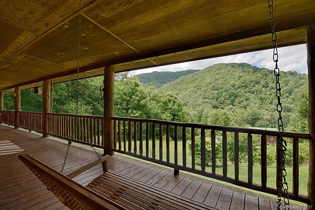 95 Straightup Road Maggie Valley, NC 28751 - Photo 17 of 24 a balcony with wooden floor in outdoor space