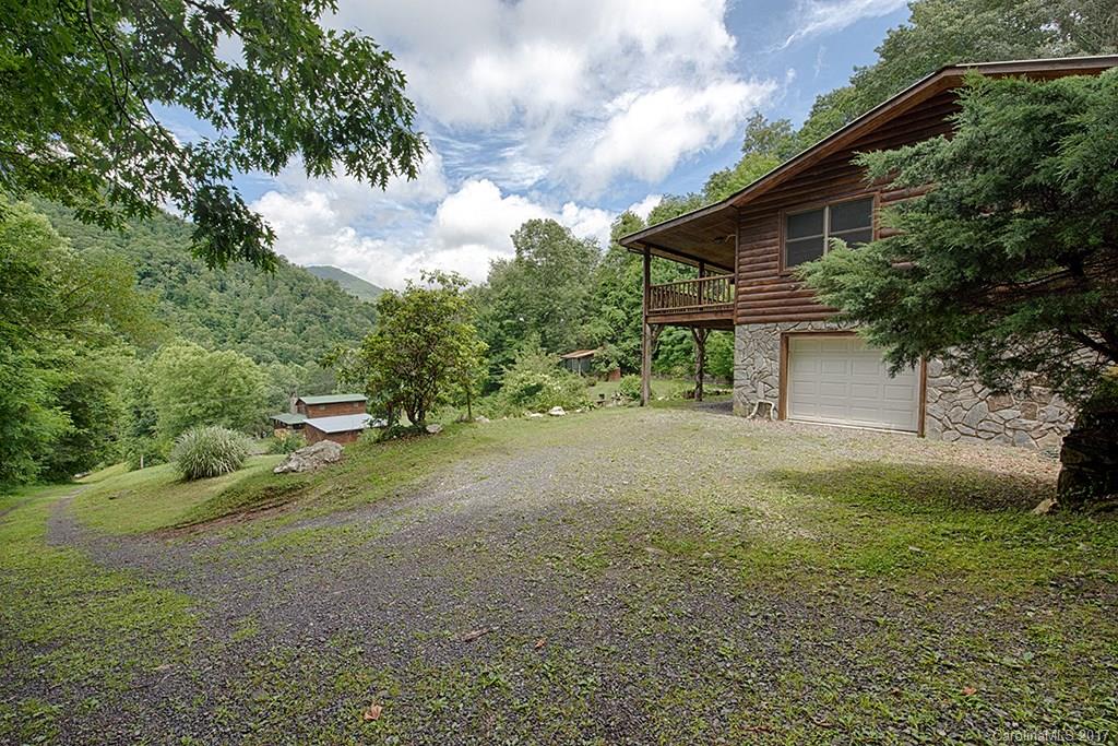 95 Straightup Road Maggie Valley, NC 28751 - Photo 20 of 24 a view of a house with a yard