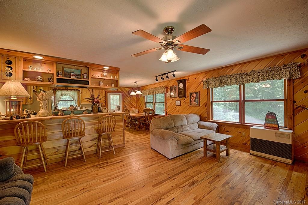 95 Straightup Road Maggie Valley, NC 28751 - Photo 5 of 24 a living room with furniture and a large window