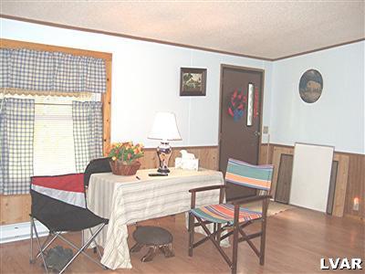 415 Roberts Road Effort, PA 18330 - Photo 3 of 5 a dining room with furniture and window