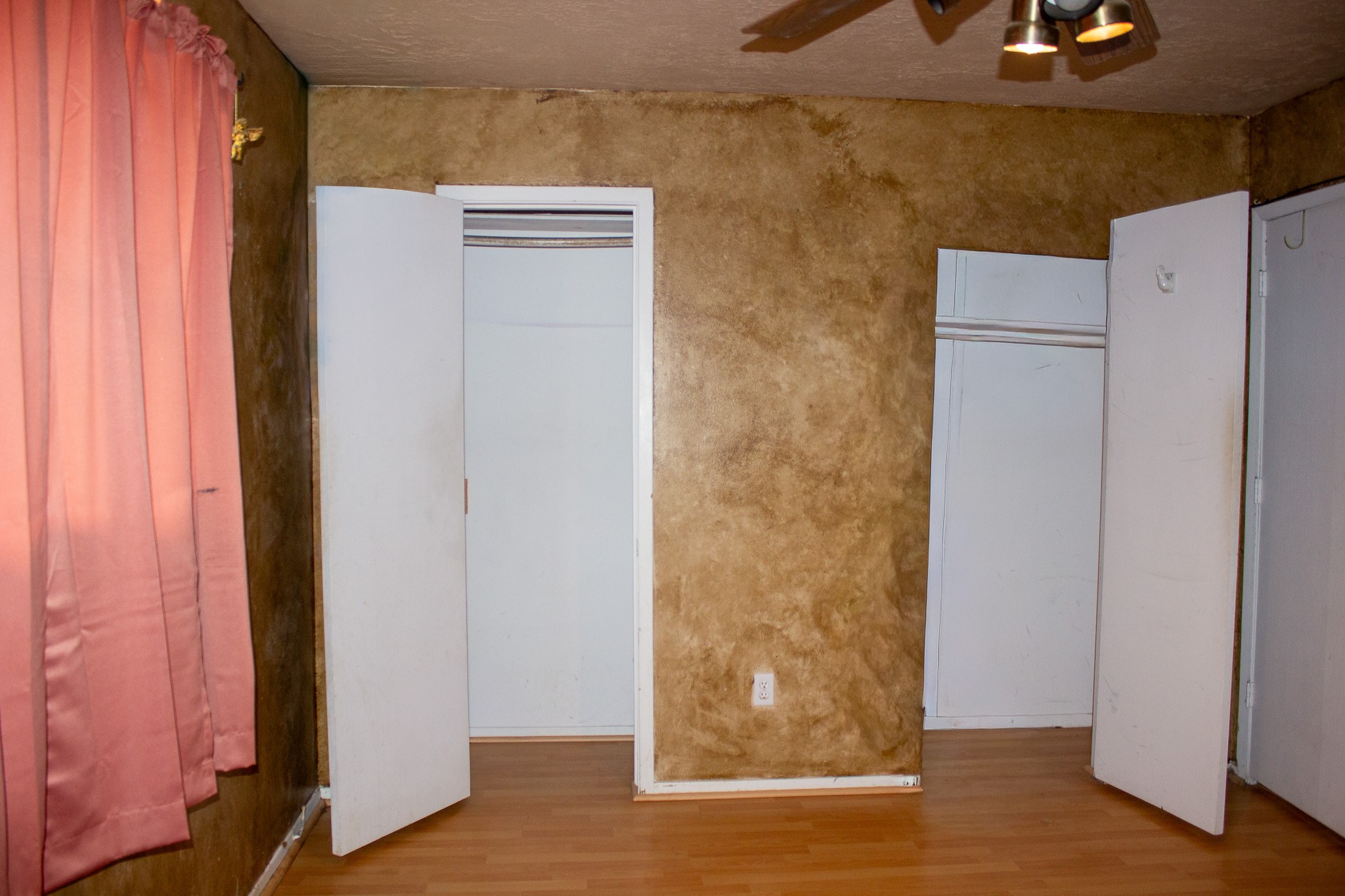 24765 Wicklow Road Hempstead, TX 77445 - Photo 19 of 29 a view of a refrigerator in kitchen and an empty room