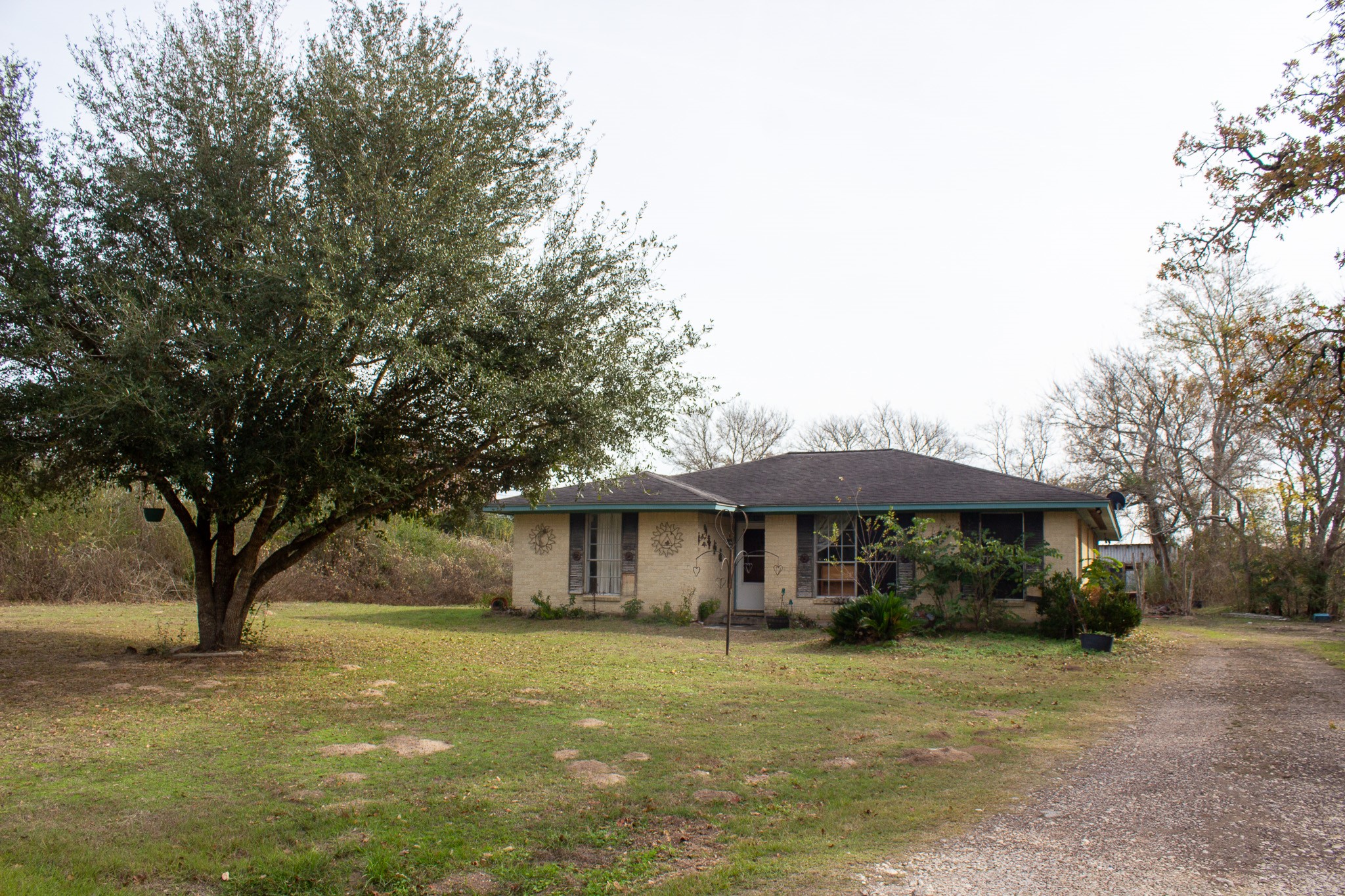 24765 Wicklow Road Hempstead, TX 77445 - Photo 6 of 29 a view of a house with a yard and sitting area