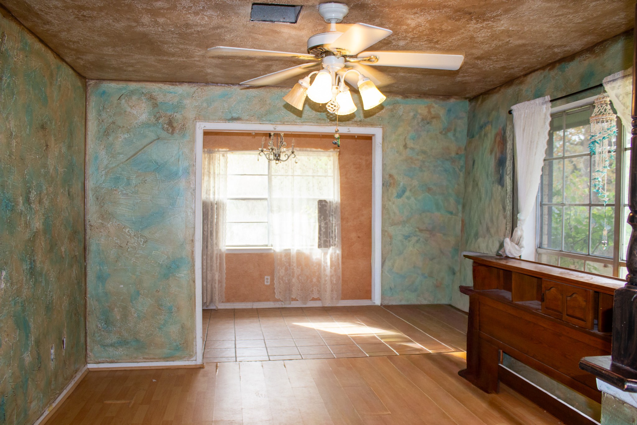 24765 Wicklow Road Hempstead, TX 77445 - Photo 9 of 29 a view of an entryway with a chandelier fan