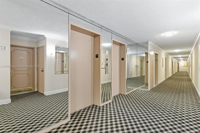 a bathroom with a glass door shower