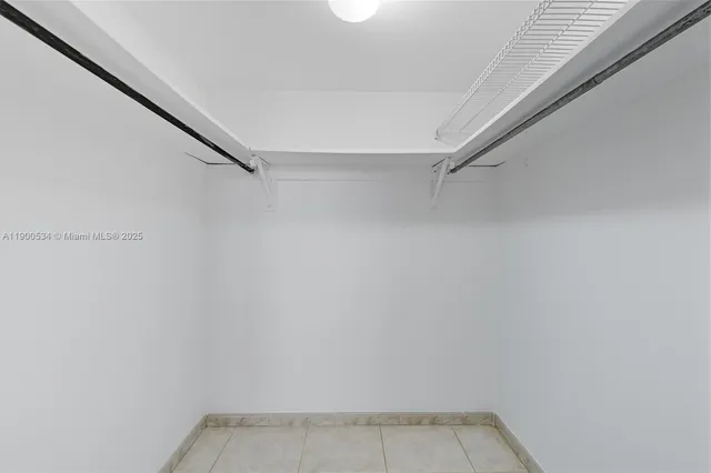 a view of an empty walk in closet