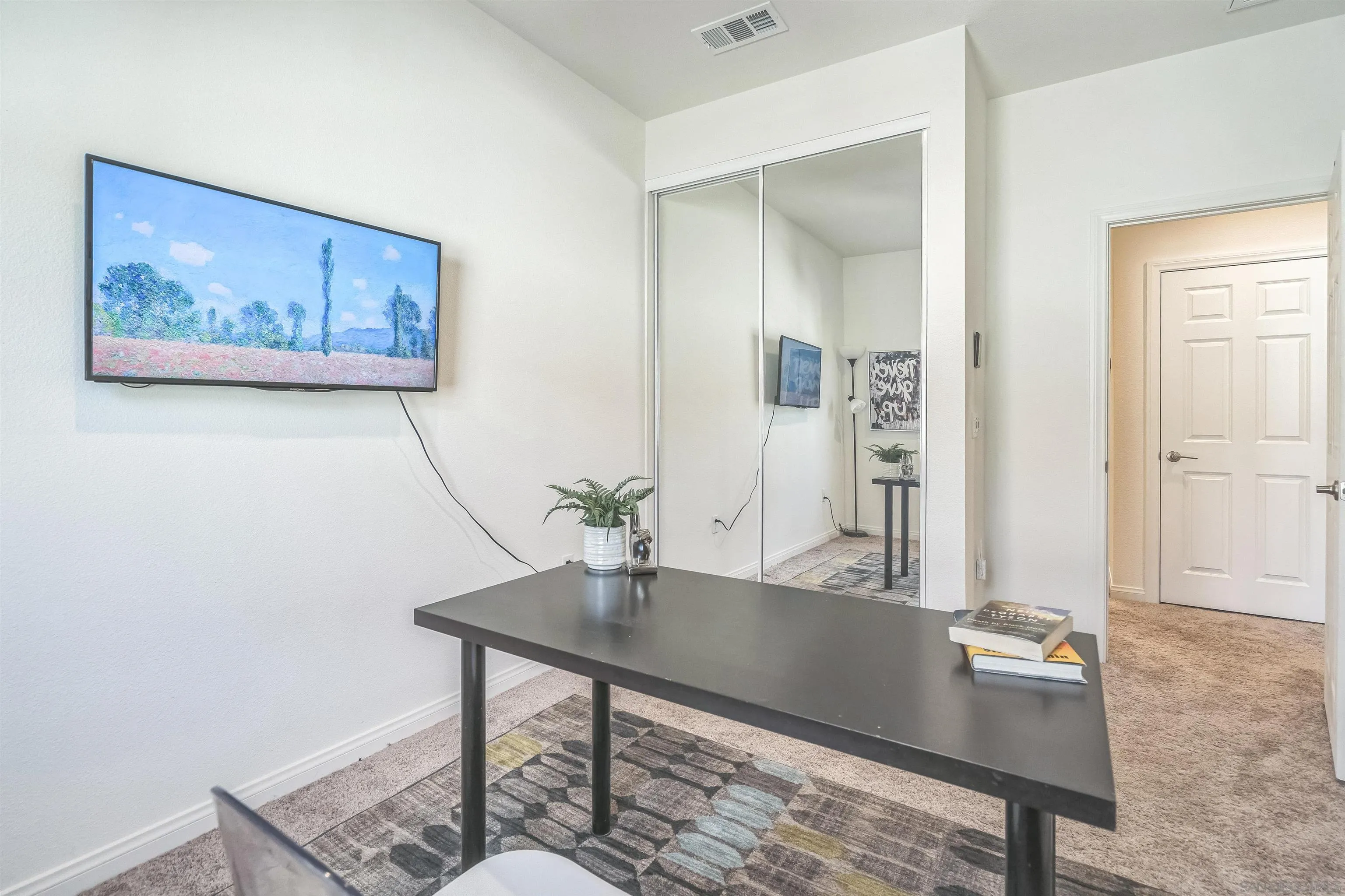 2018 Barite Street Spring Valley, CA 91977 - Photo 19 of 47 a workspace with furniture and window