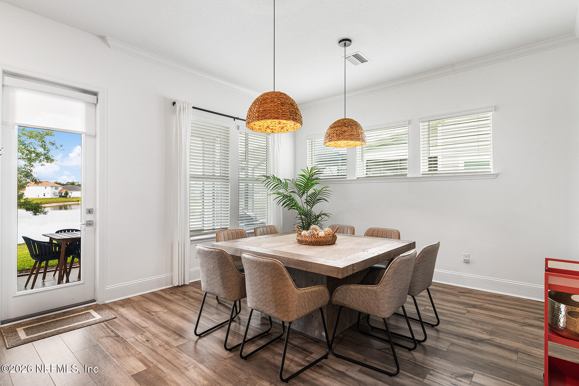 637 Navigators Road St. Johns, FL 32259 - Photo 15 of 42 a dining room view with a table and chairs