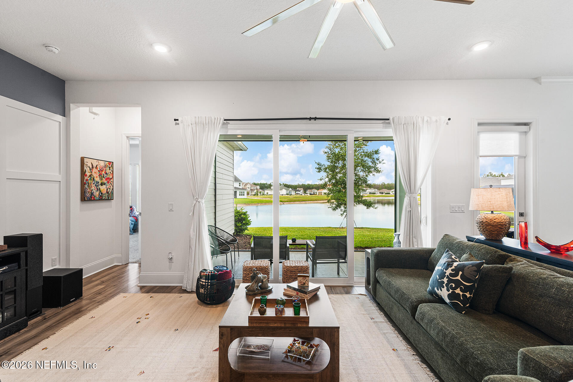 637 Navigators Road St. Johns, FL 32259 - Photo 16 of 42 a living room with furniture and a large window