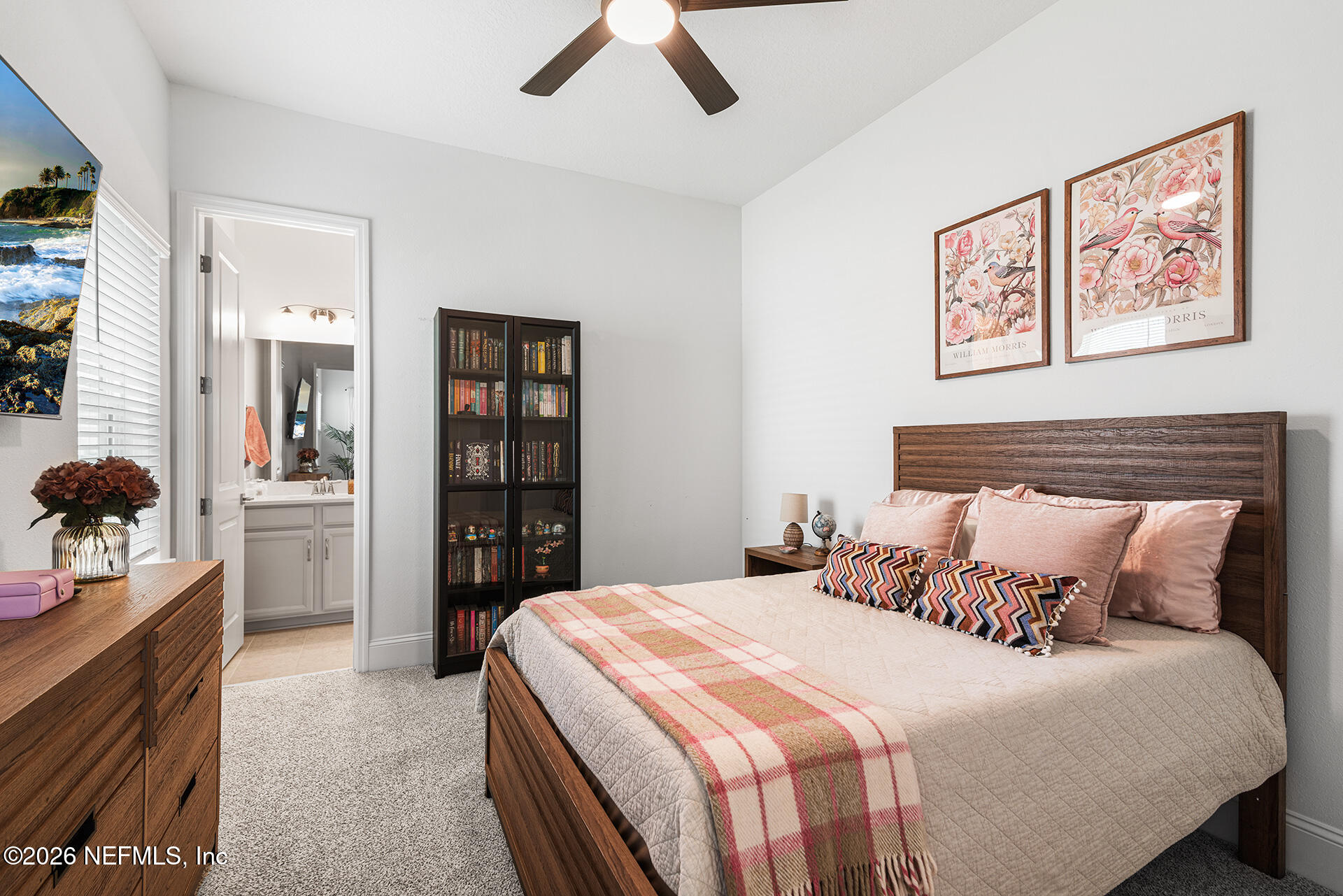 637 Navigators Road St. Johns, FL 32259 - Photo 19 of 42 a bedroom with a bed and walk in closet