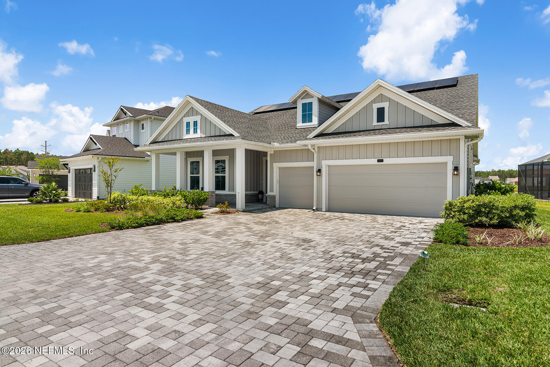 637 Navigators Road St. Johns, FL 32259 - Photo 28 of 42 a front view of a house with a garden and yard
