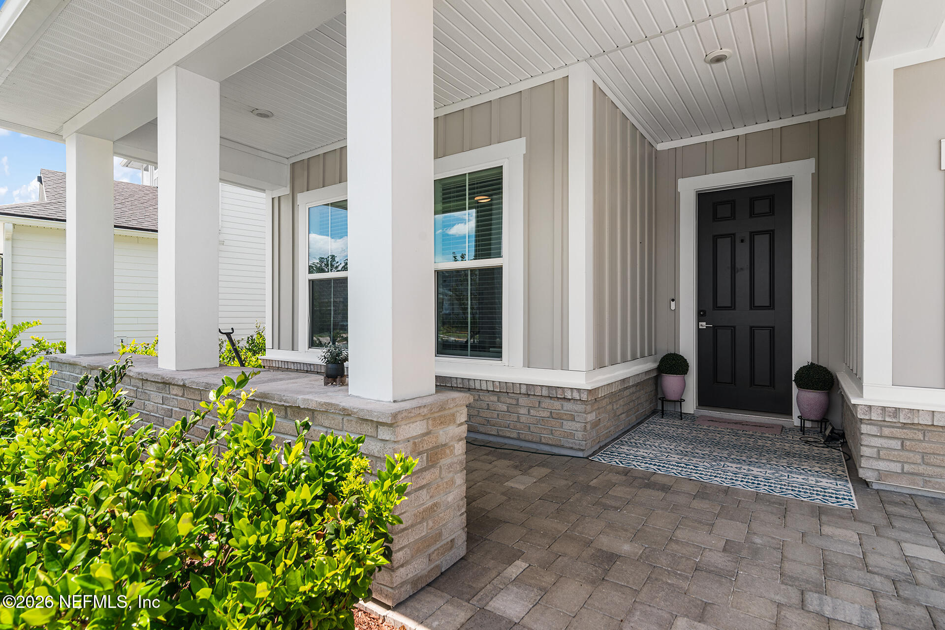 637 Navigators Road St. Johns, FL 32259 - Photo 30 of 42 a front view of a house with garden