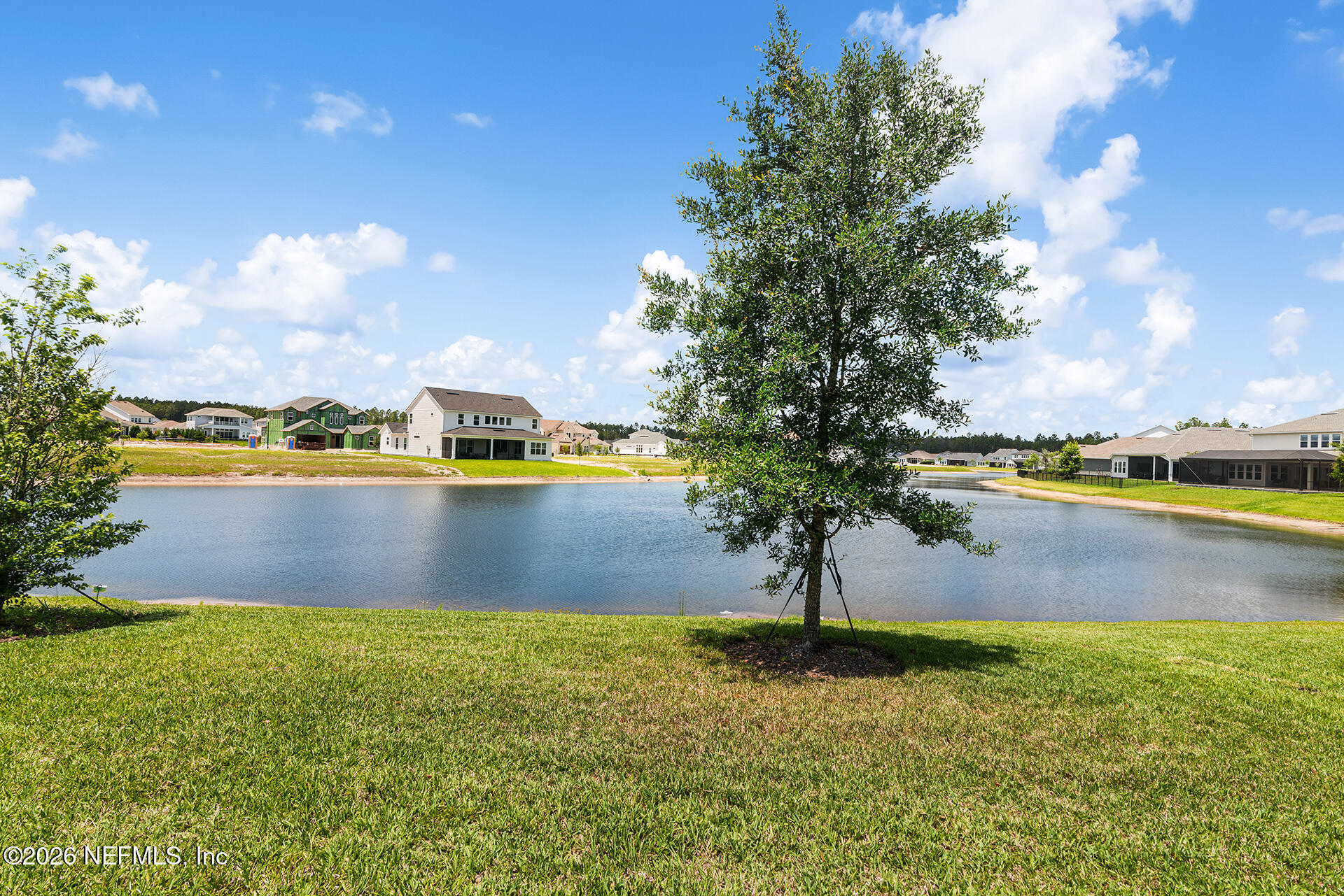 637 Navigators Road St. Johns, FL 32259 - Photo 33 of 42 a view of a lake with a yard