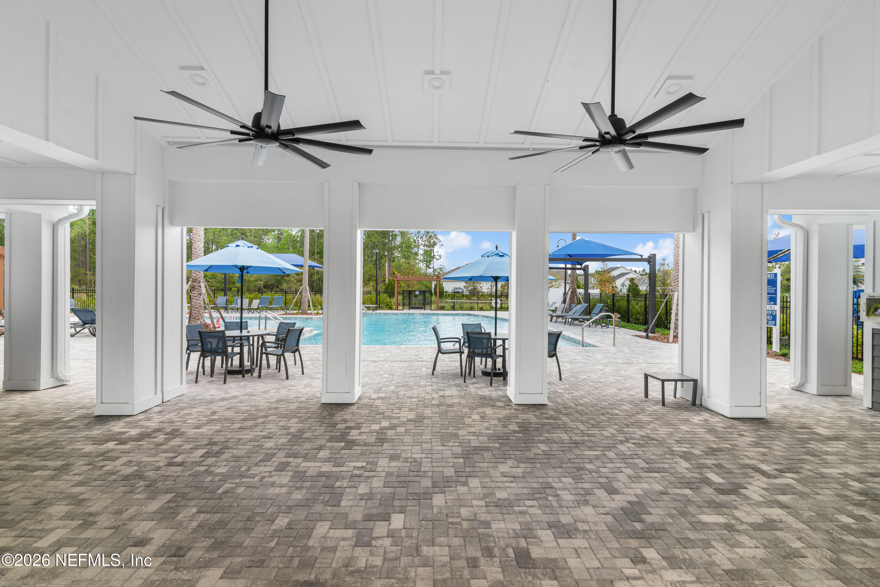637 Navigators Road St. Johns, FL 32259 - Photo 36 of 42 a room with lots of furniture and a large window