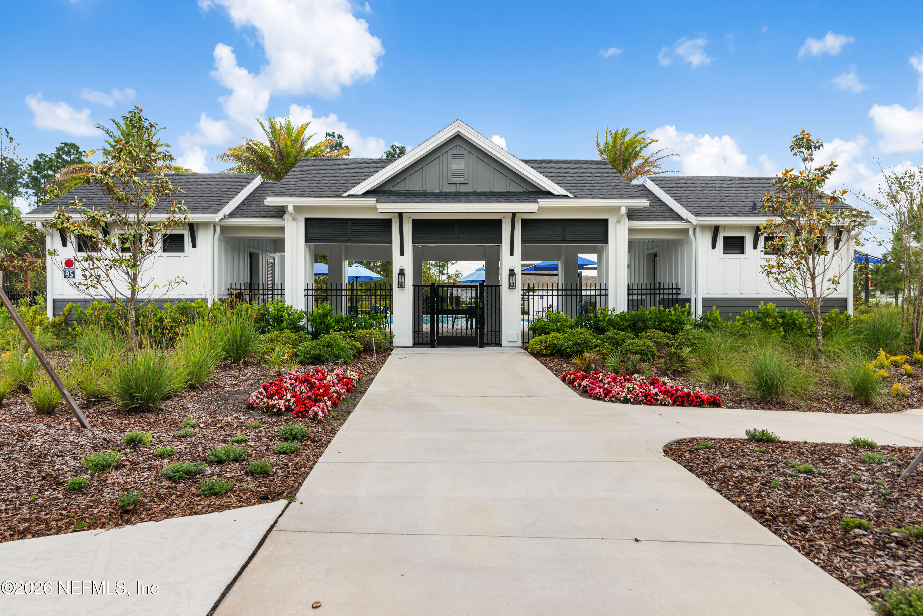 637 Navigators Road St. Johns, FL 32259 - Photo 37 of 42 a front view of a house with a garden