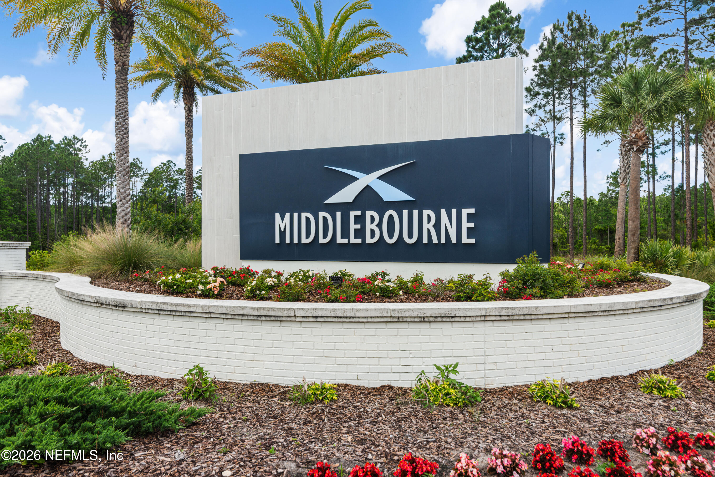 637 Navigators Road St. Johns, FL 32259 - Photo 39 of 42 a view of sign board with flower and wooden fence