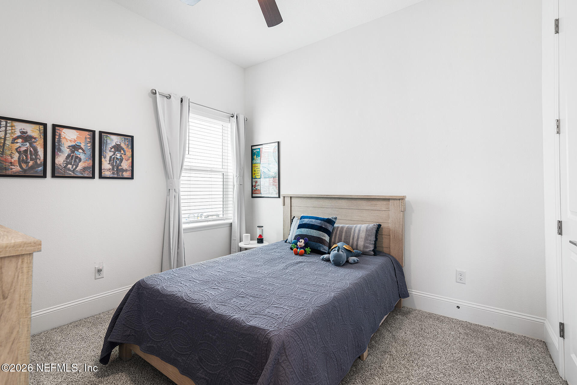 637 Navigators Road St. Johns, FL 32259 - Photo 5 of 42 a bedroom with a bed and window