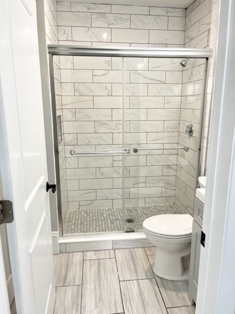 1 Ropes Street, Unit 2 Salem, MA 01970 - Photo 13 of 16 a bathroom with a toilet and a shower