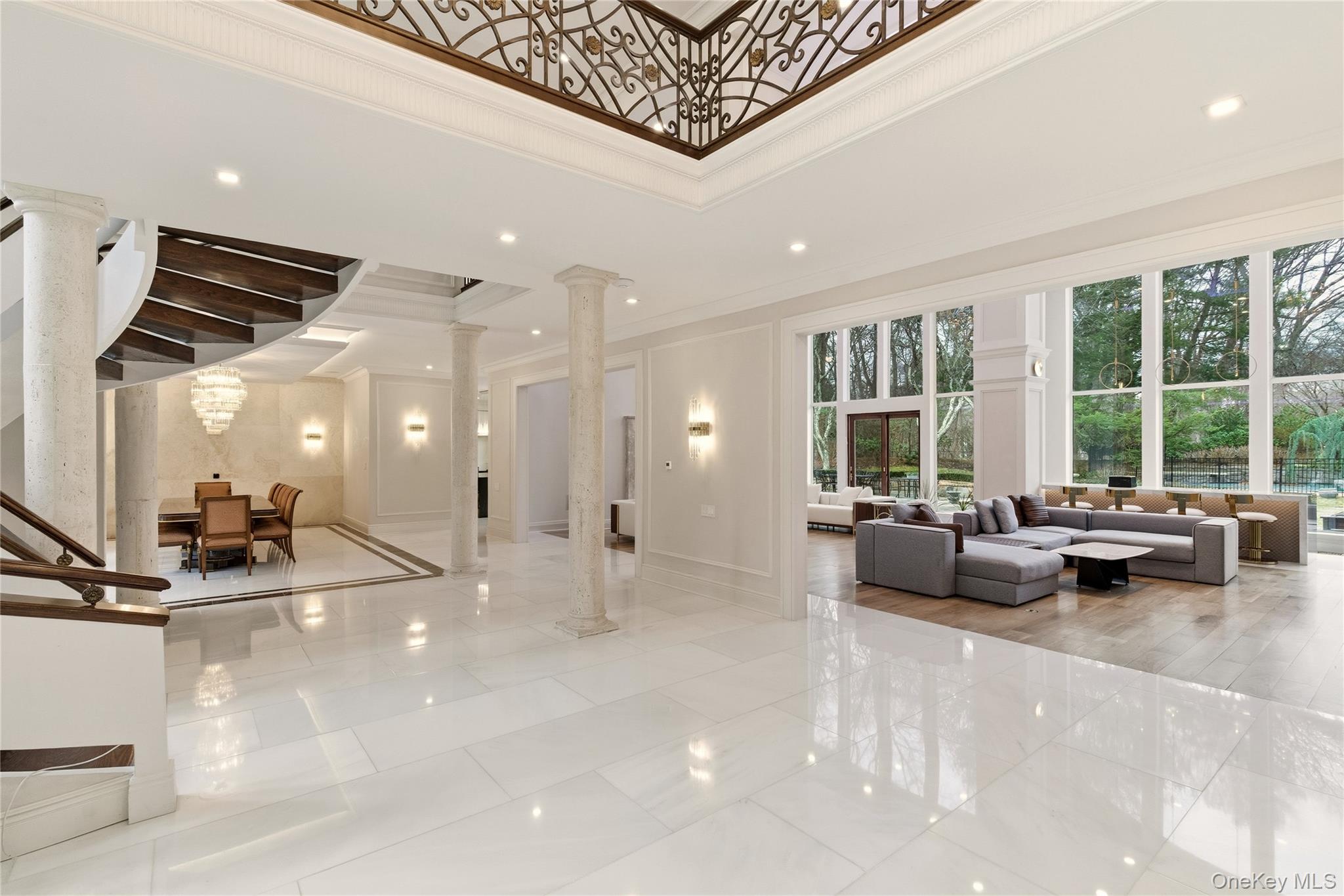 55 Coves Run Syosset, NY 11791 - Photo 4 of 50 a living room with furniture and large windows