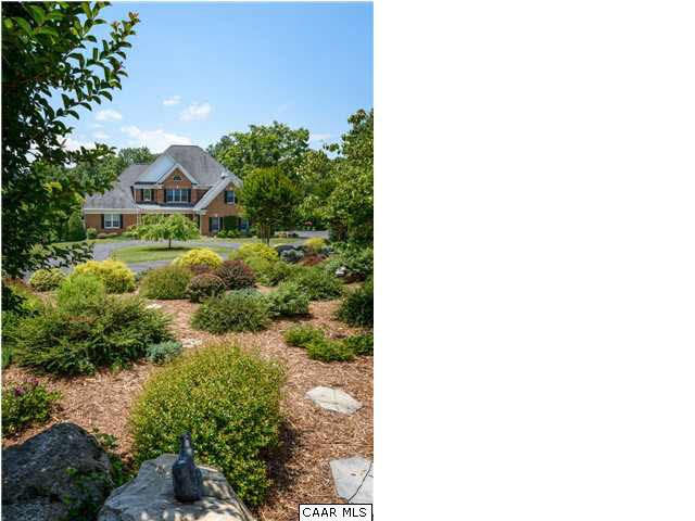 560 Rodes Drive Charlottesville, VA 22903 - Photo 23 of 23 a front view of a house with a yard