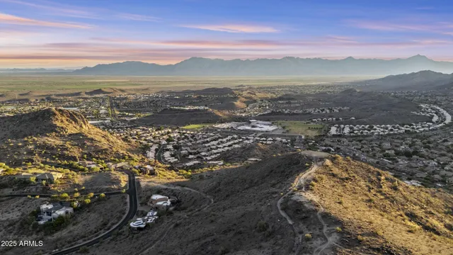 a view of a city with mountains in the background