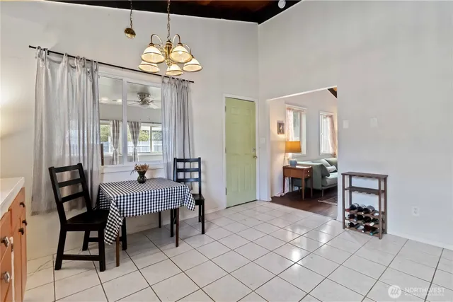 a view of a livingroom with furniture and window